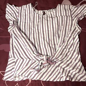 A red, white and blue striped blouse